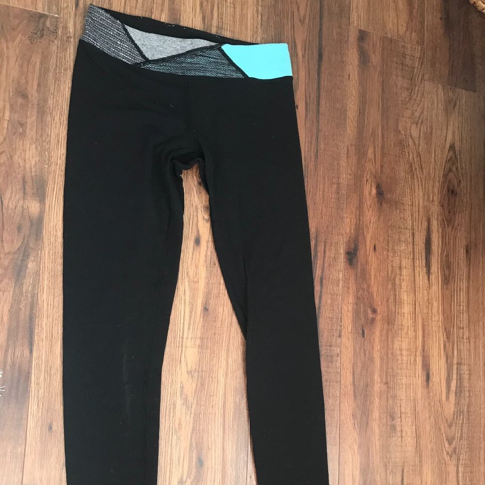 Black Ivivva leggings with coloured waistband